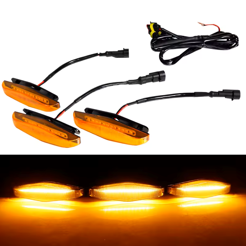 Amber LED turn signals with wiring harness on a white background