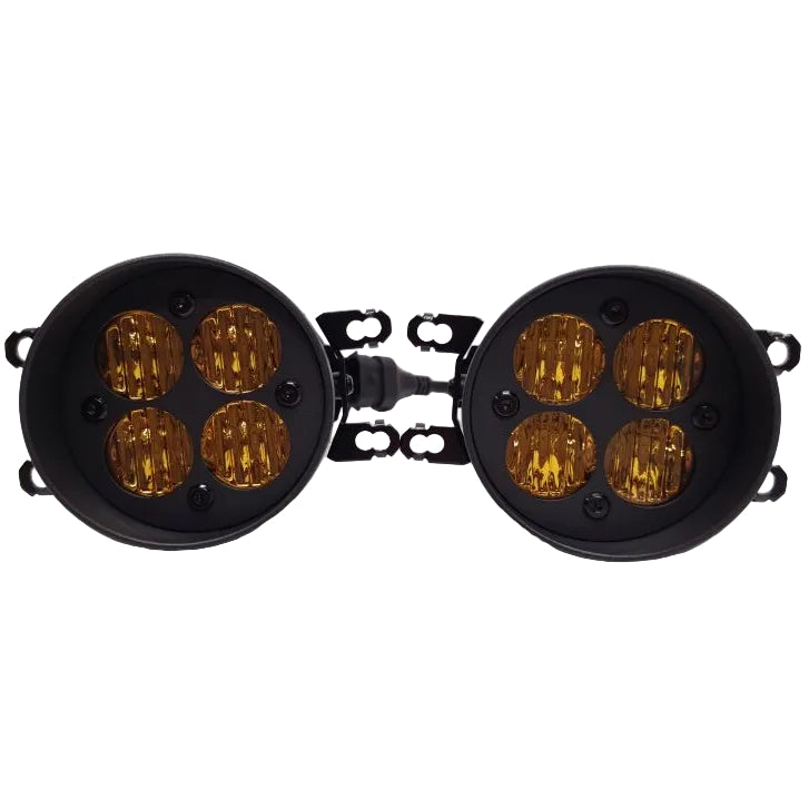 A pair of round black motorcycle LED headlights with amber yellow lenses, shown against a plain light gray background.