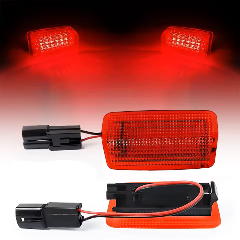 Red full replacement LED courtesy lights with connectors on a gradient background