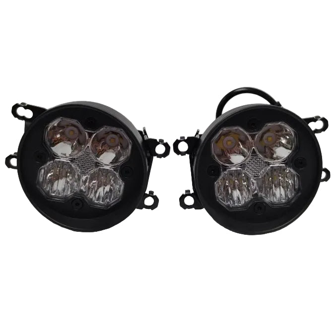 A pair of round black automotive LED fog lights with clear protective lenses and visible internal reflectors, shown on a plain light gray studio background.